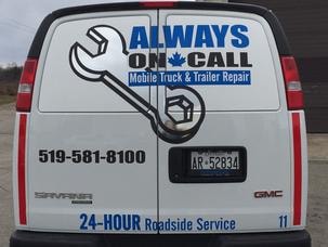 Service van with open rear doors showing tools